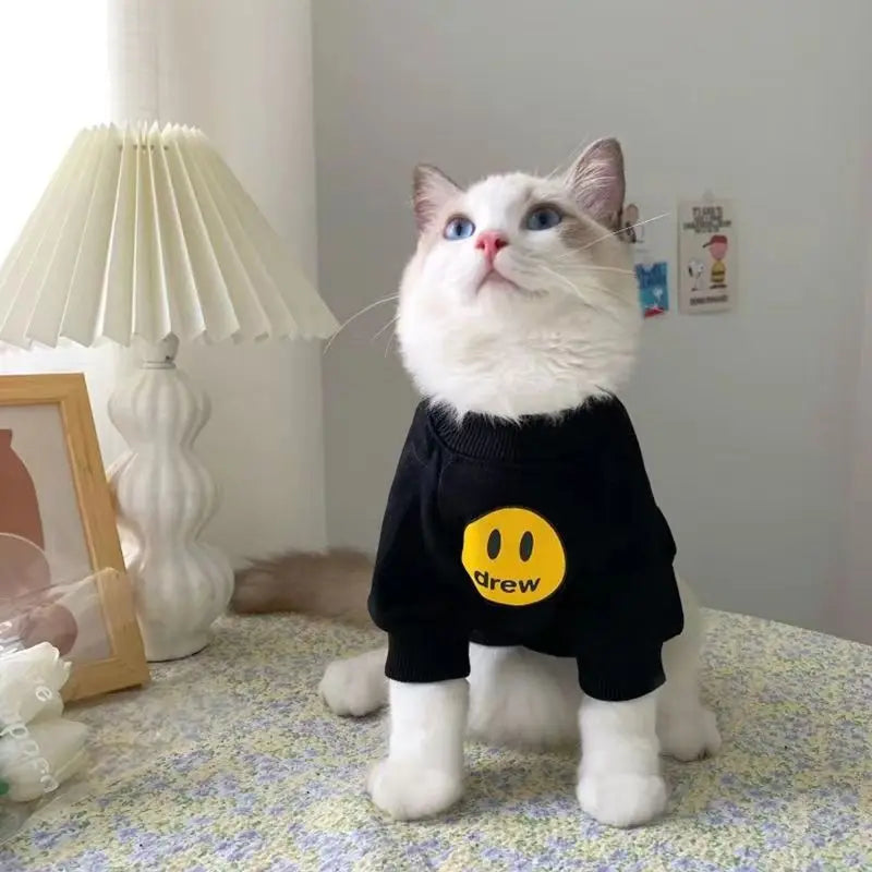 Pet Cat Clothing Fashion Trends Autumn and Winter Kittens Anti Hair Loss Smiling Face Hoodies Cat Autumn Clothing Pet Supplies